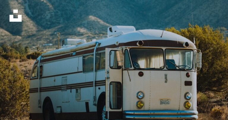 Bus parked in a desert landscape for a West Texas travel guide