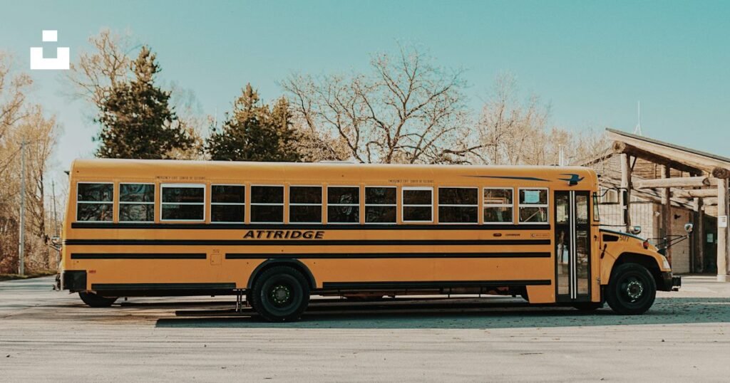 Yellow bus traveling on a city road for a Chicago area guide